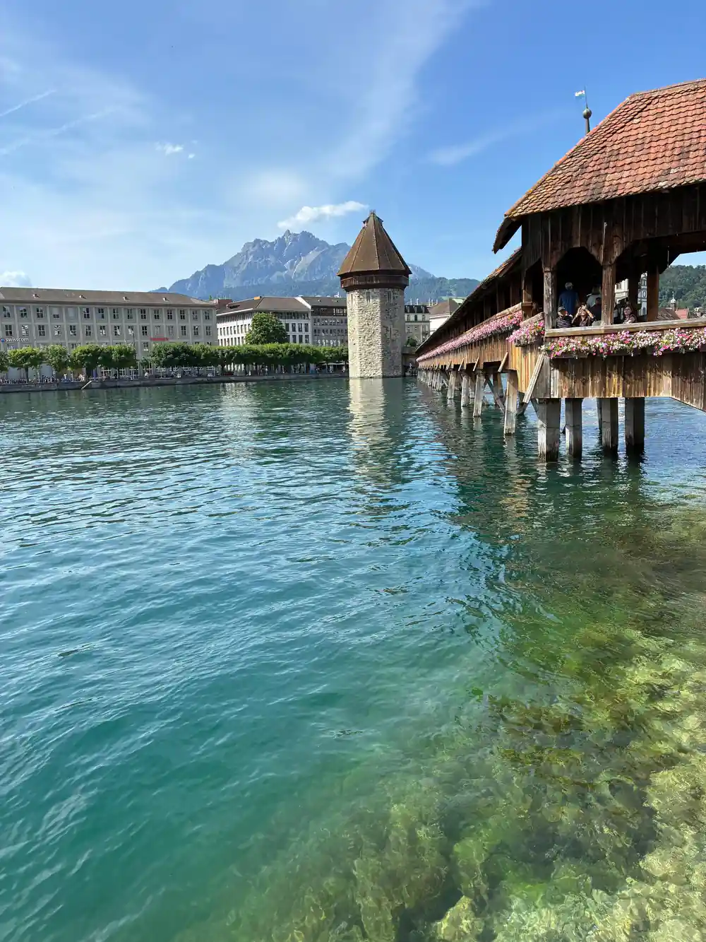The Chapel Bridge water tower with Pilatus behind it