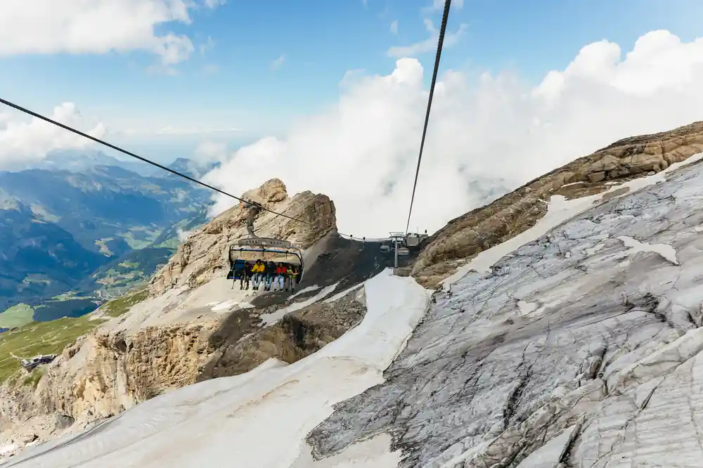 Ice Flyer chairs crossing the glacier with the valley far below