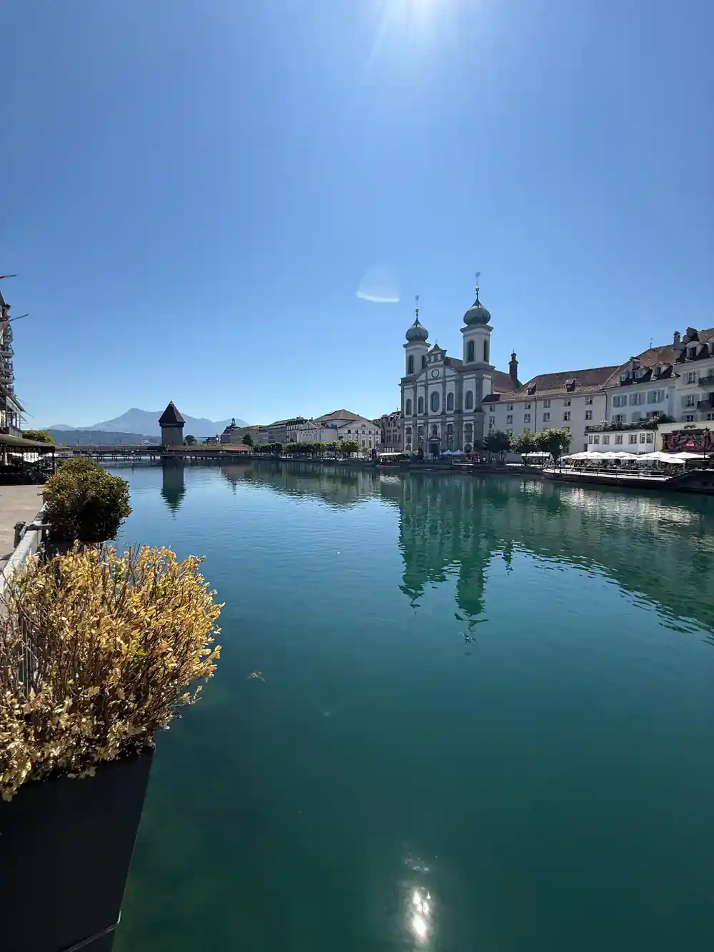 The Lucerne waterfront and church seen across the river