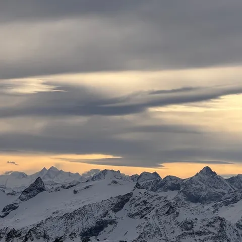 Snow-covered peaks around Titlis at dusk